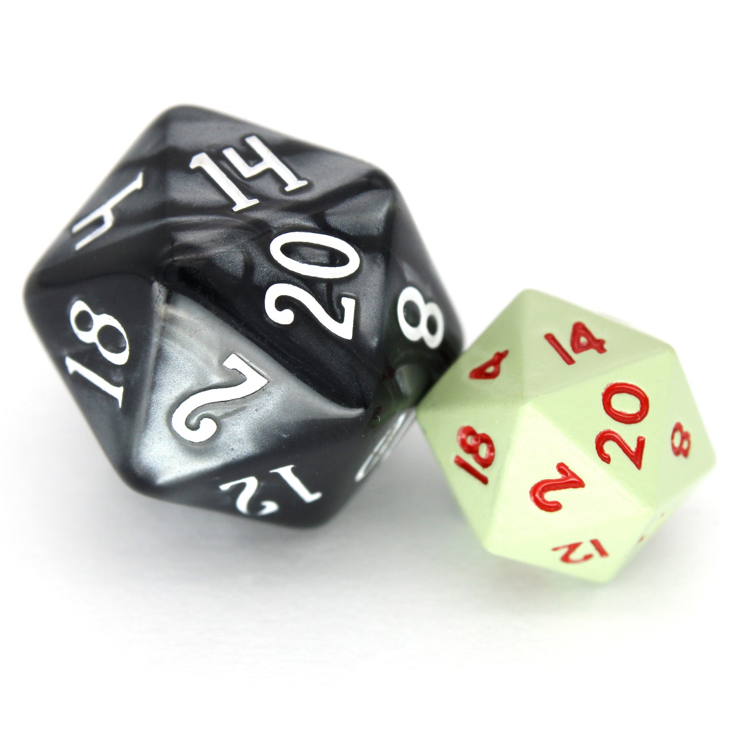 Gremlins is a 7-piece set of matte, pale-green colored 10mm metal dice with magenta inking.