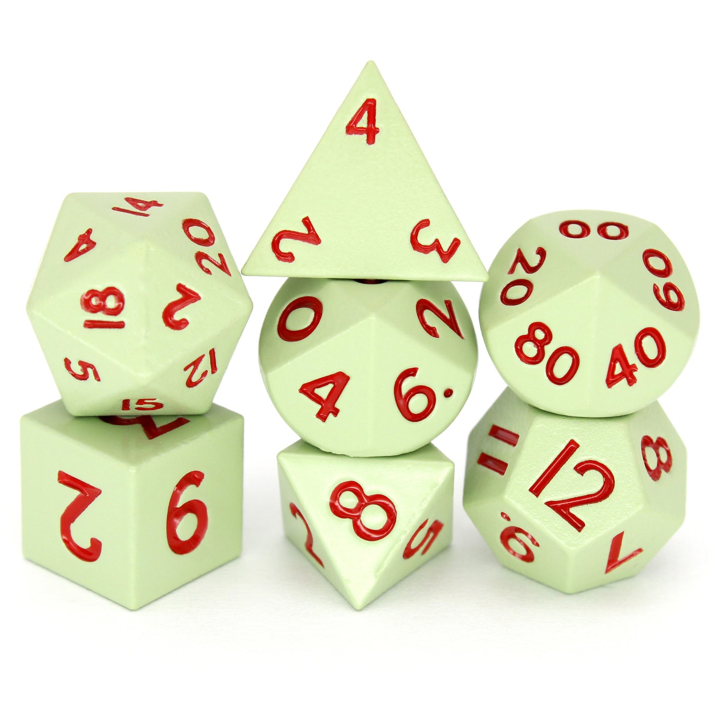 Gremlins is a 7-piece set of matte, pale-green colored 10mm metal dice with magenta inking.
