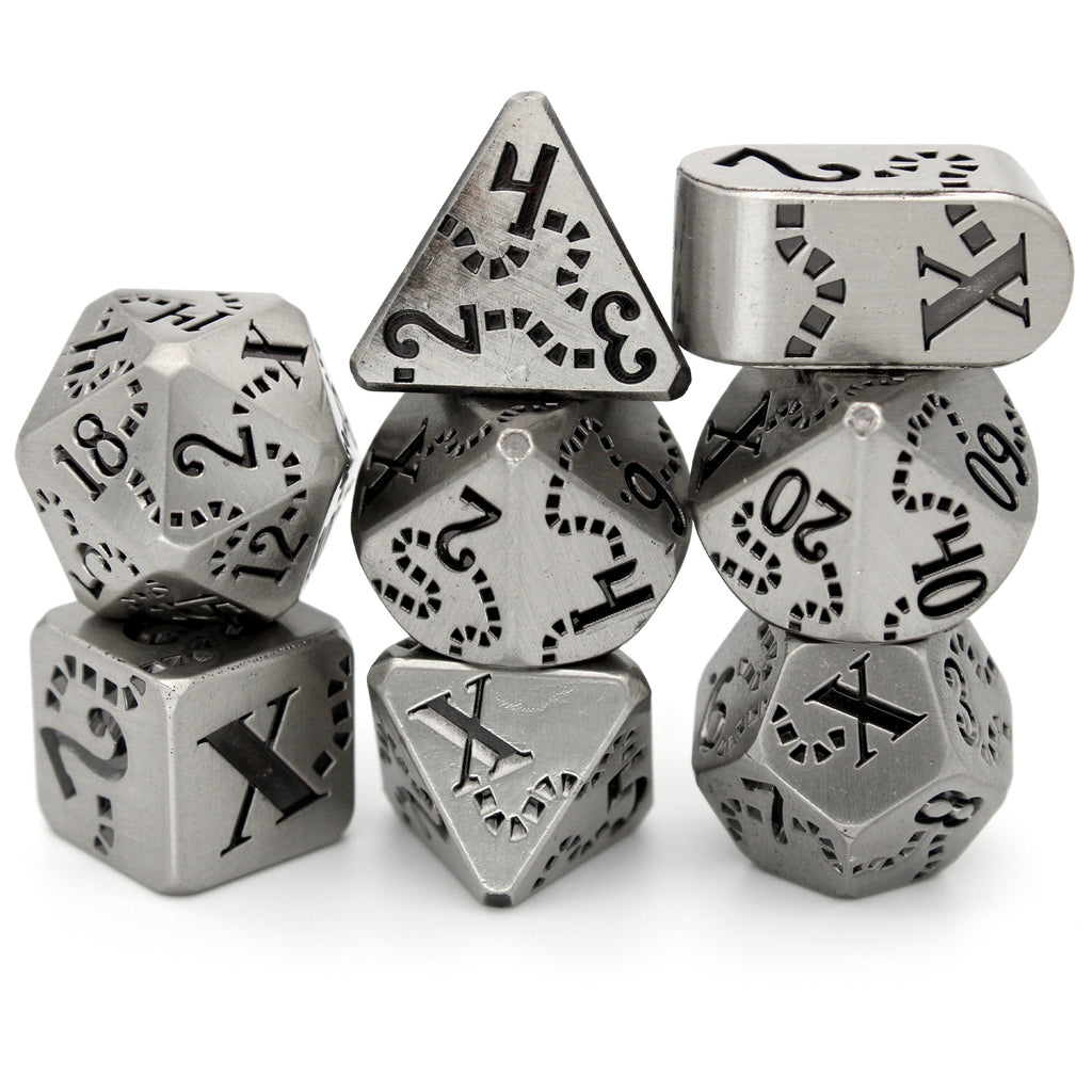 Hispaniola is a Dice Envy Exclusive 8-piece set of silver metal dice with a treasure map engraving inked in black.