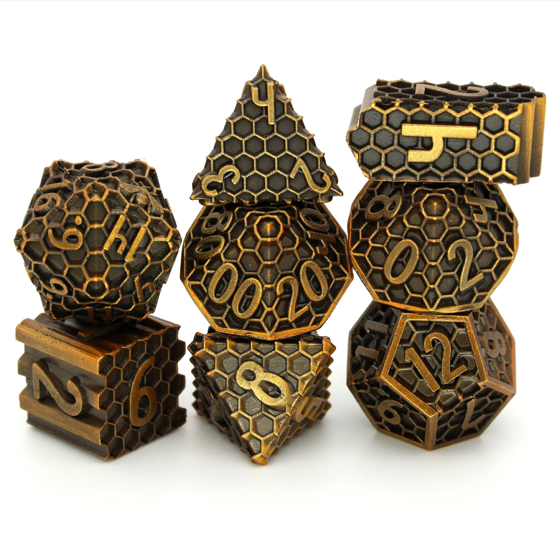 Hive Mind is an 8-piece Dice Envy exclusive set of honeycomb patterned dice in aged gold. This set includes an Infinity d4!