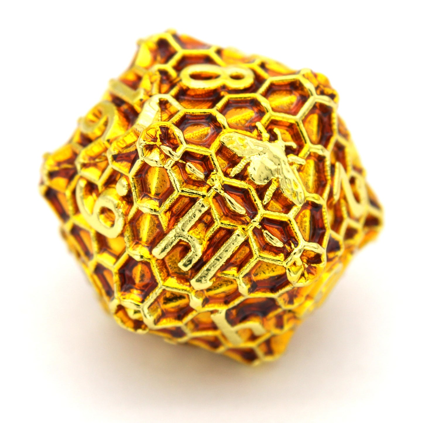 Honeycomb is an 8-piece Dice Envy Original set of honeycomb patterned dice, plated in bright gold and filled with amber enamel.