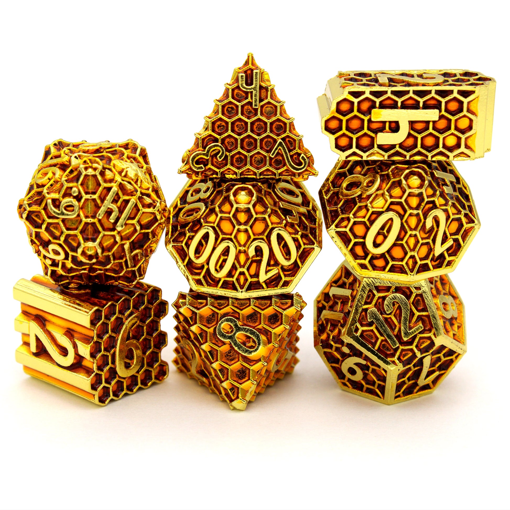 Honeycomb is an 8-piece Dice Envy Original set of honeycomb patterned dice, plated in bright gold and filled with amber enamel.