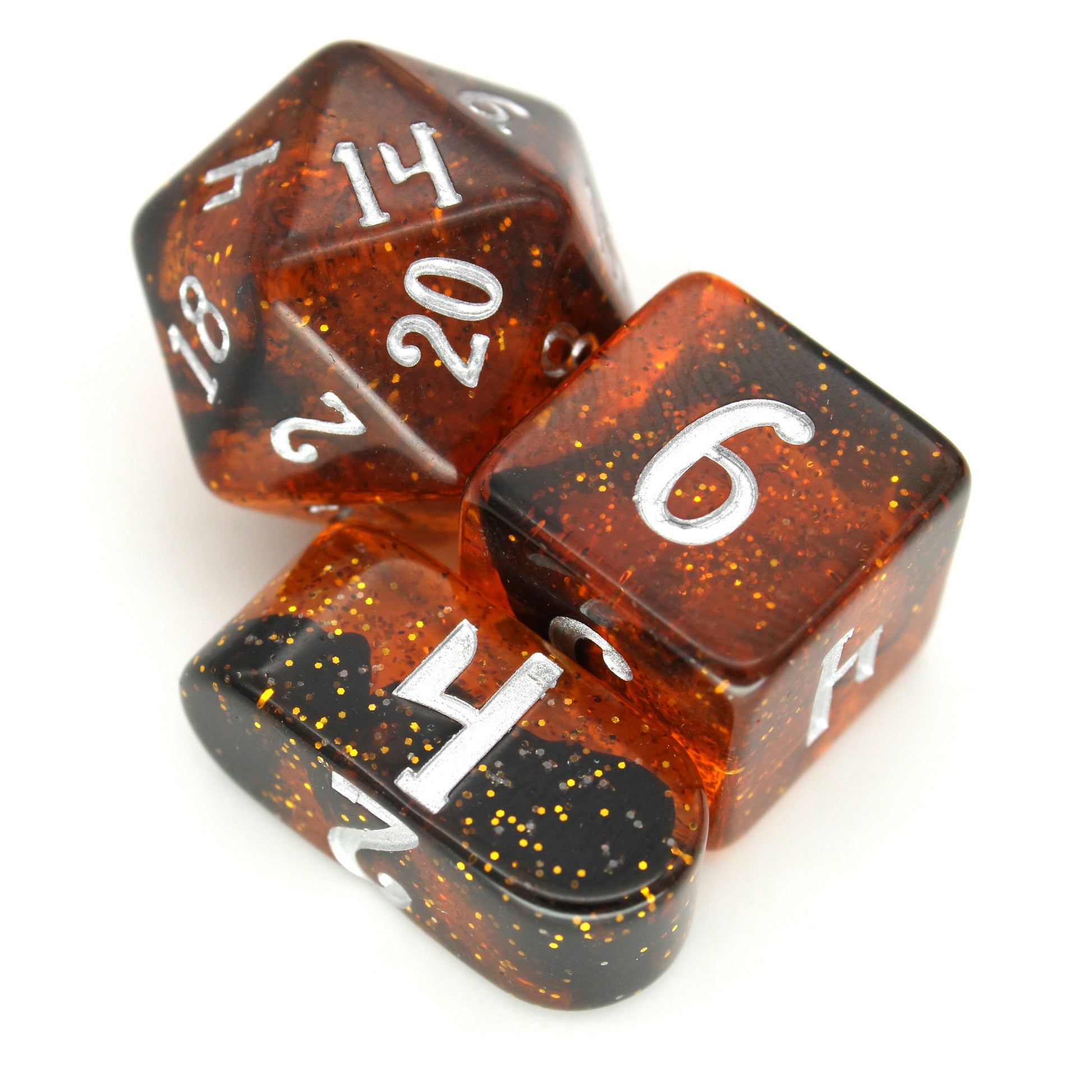 Honeyed Words is a 10-piece amber resin set with swirls of black gold glitter, inked in silver.