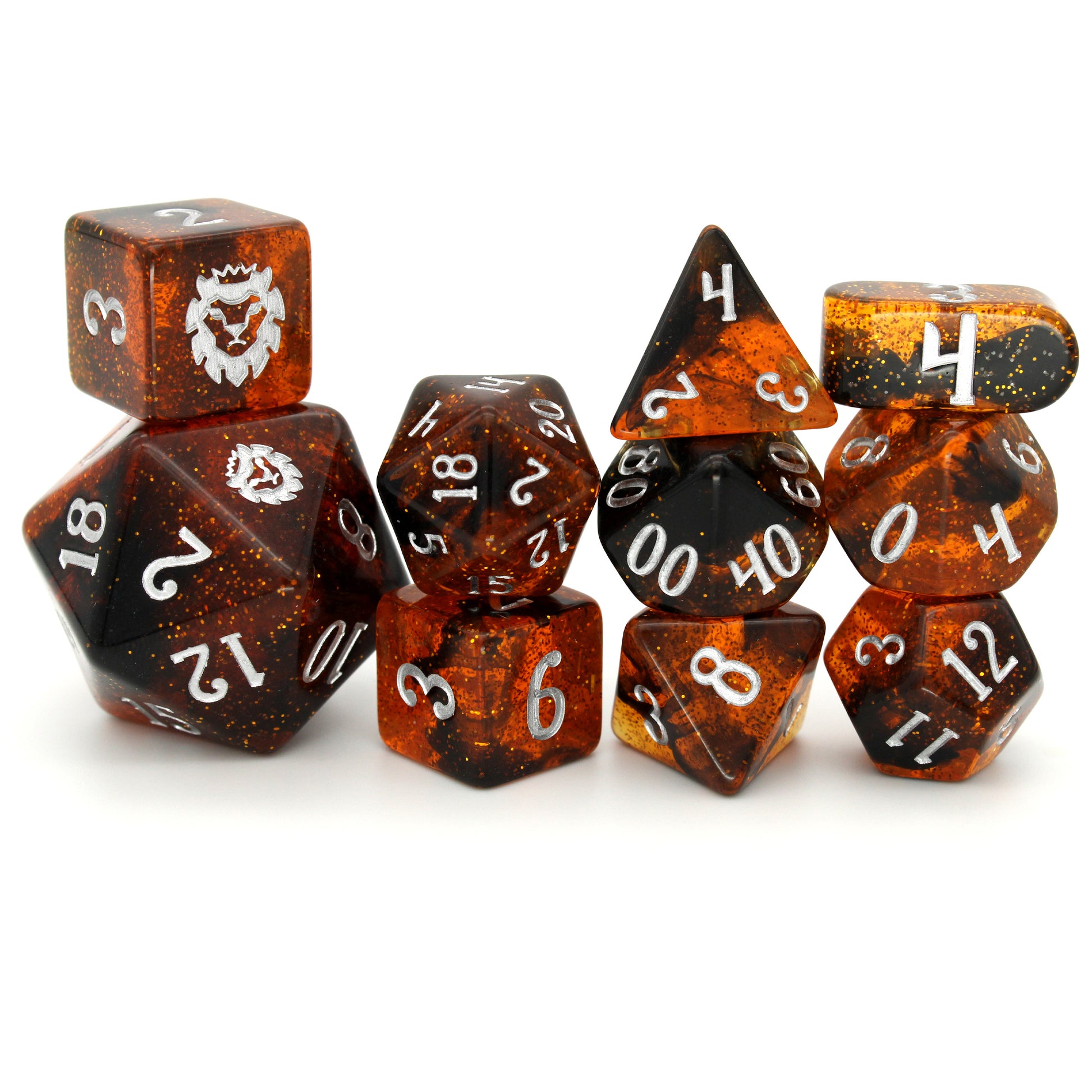 Honeyed Words is a 10-piece amber resin set with swirls of black gold glitter, inked in silver.