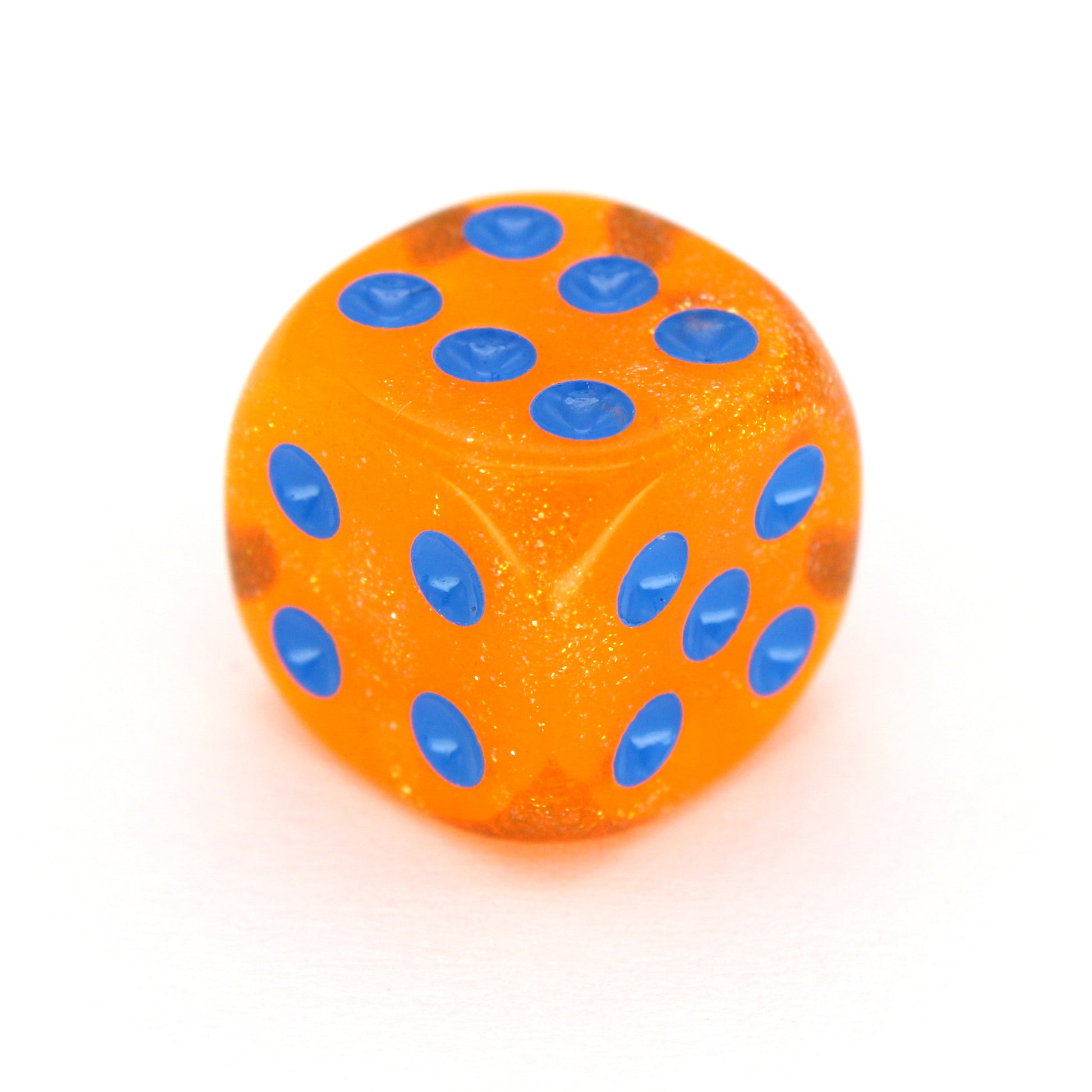 In Queso Emergency is a 10-piece set of semi-transparent orange resin 12mm d6s, filled with microglitter, with pips inked in bright blue. They are part of our Pip-Squeaks collection.