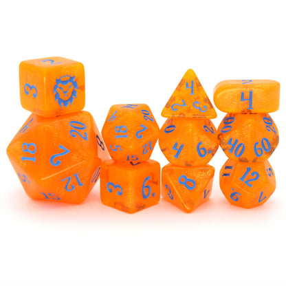 In Queso Emergency is a 10-piece semi-transparent orange resin set filled with micro glitter, and inked in bright blue.