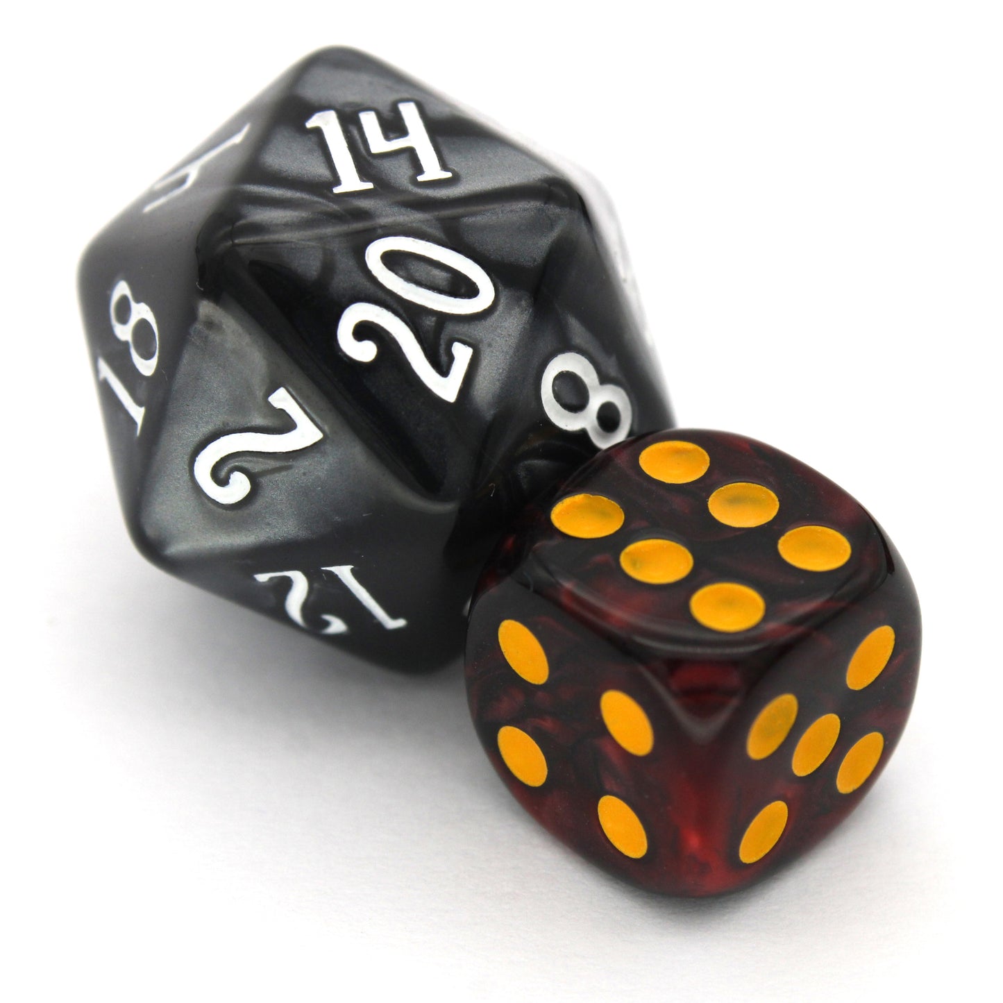 Infernal Fire is a 10-piece set of swirled black and red 12mm d6s, with pips inked in goldenrod yellow. They are part of our Pip-Squeaks collection.