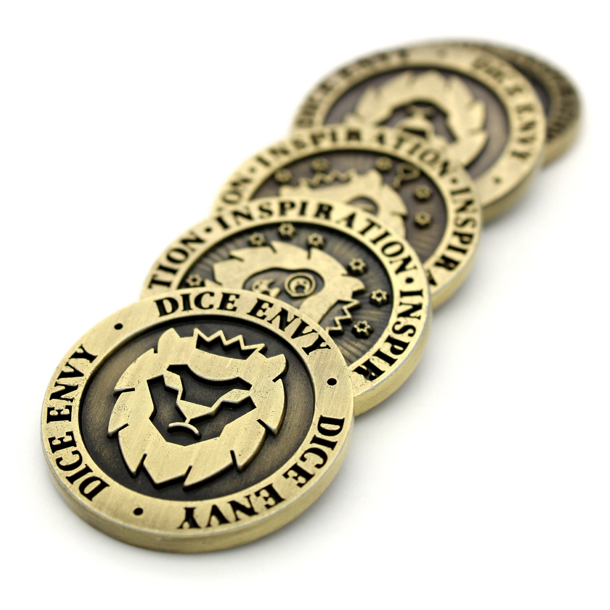 Inspiration Coins are a set of five double-sided, ancient gold colored metal tokens each measuring 30mm in diameter.