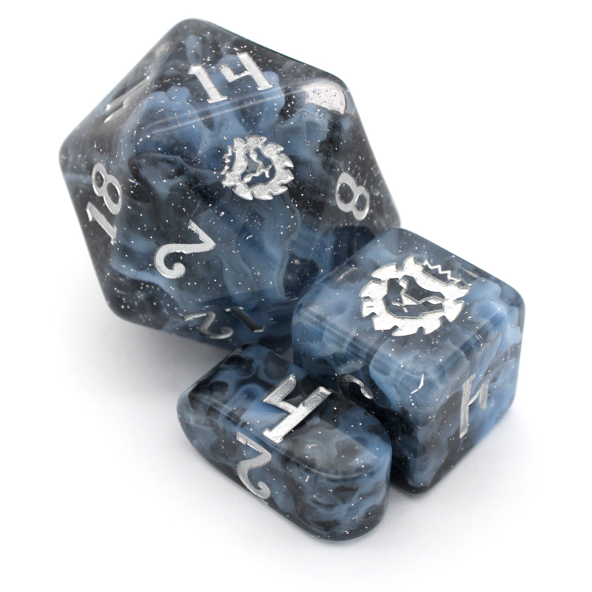 Lagoon is a 10-piece resin set featuring billowing clouds of light blue and glittery translucent black, inked in luminous silver.