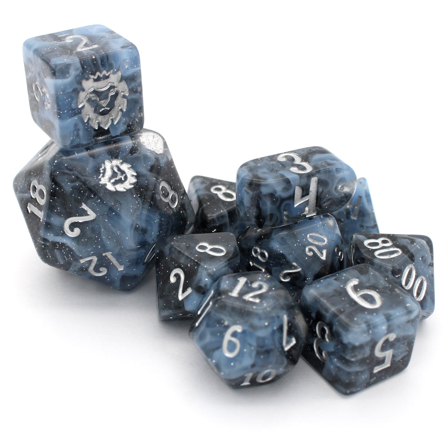 Lagoon is a 10-piece resin set featuring billowing clouds of light blue and glittery translucent black, inked in luminous silver.