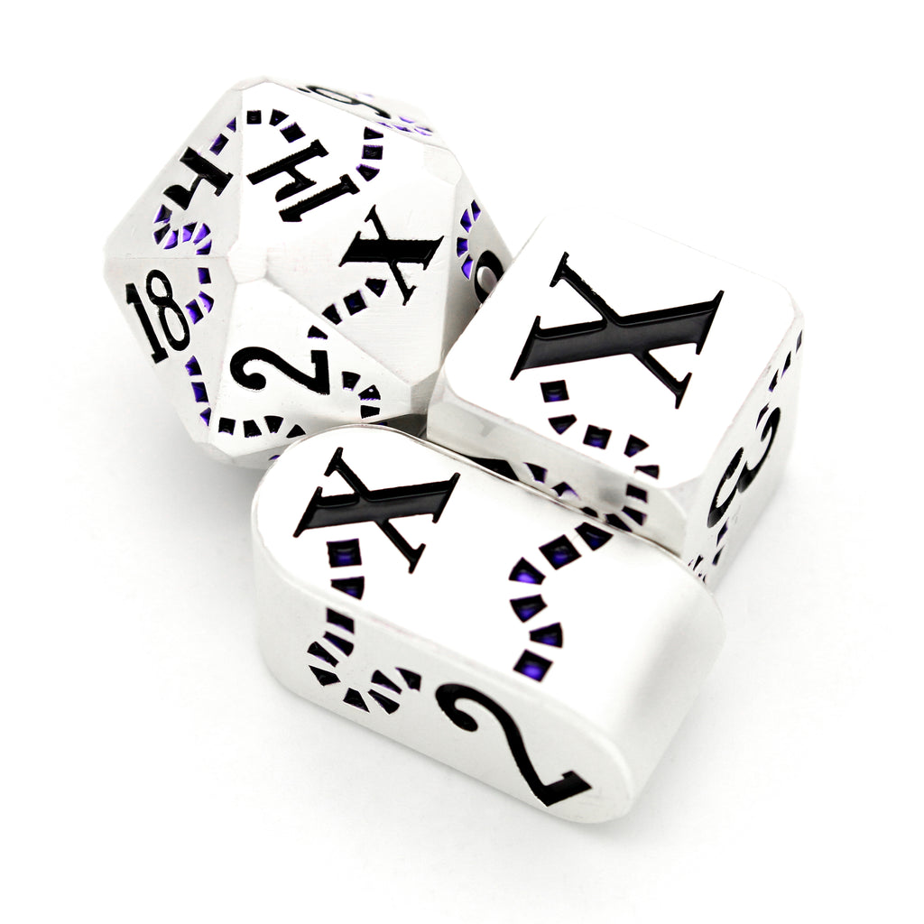 Last Breath is a Dice Envy Exclusive 8-piece set of pearled white metal dice with a treasure map engraving inked in purple and black. It is part of the Pirate Dice collection.