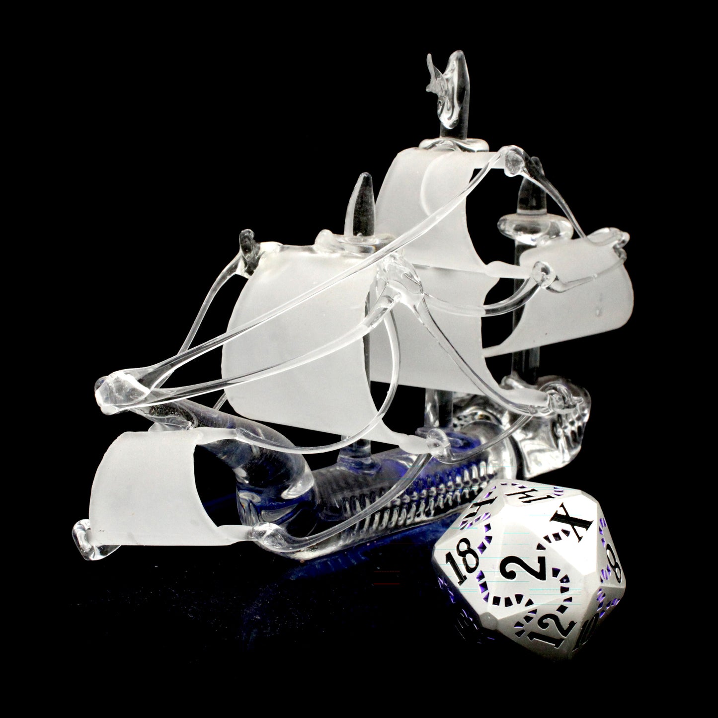Last Breath is a Dice Envy Exclusive 8-piece set of pearled white metal dice with a treasure map engraving inked in purple and black. It is part of the Pirate Dice collection.