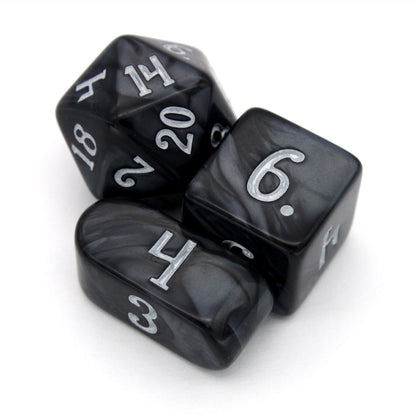 Legato is a 10-piece black acrylic set, inked in silver.
