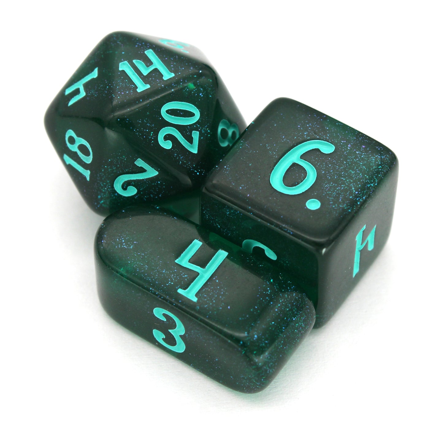 Leviathan is a 10-piece set of dark teal acrylic dice, filled with glistening blue glitter and inked in seafoam green.