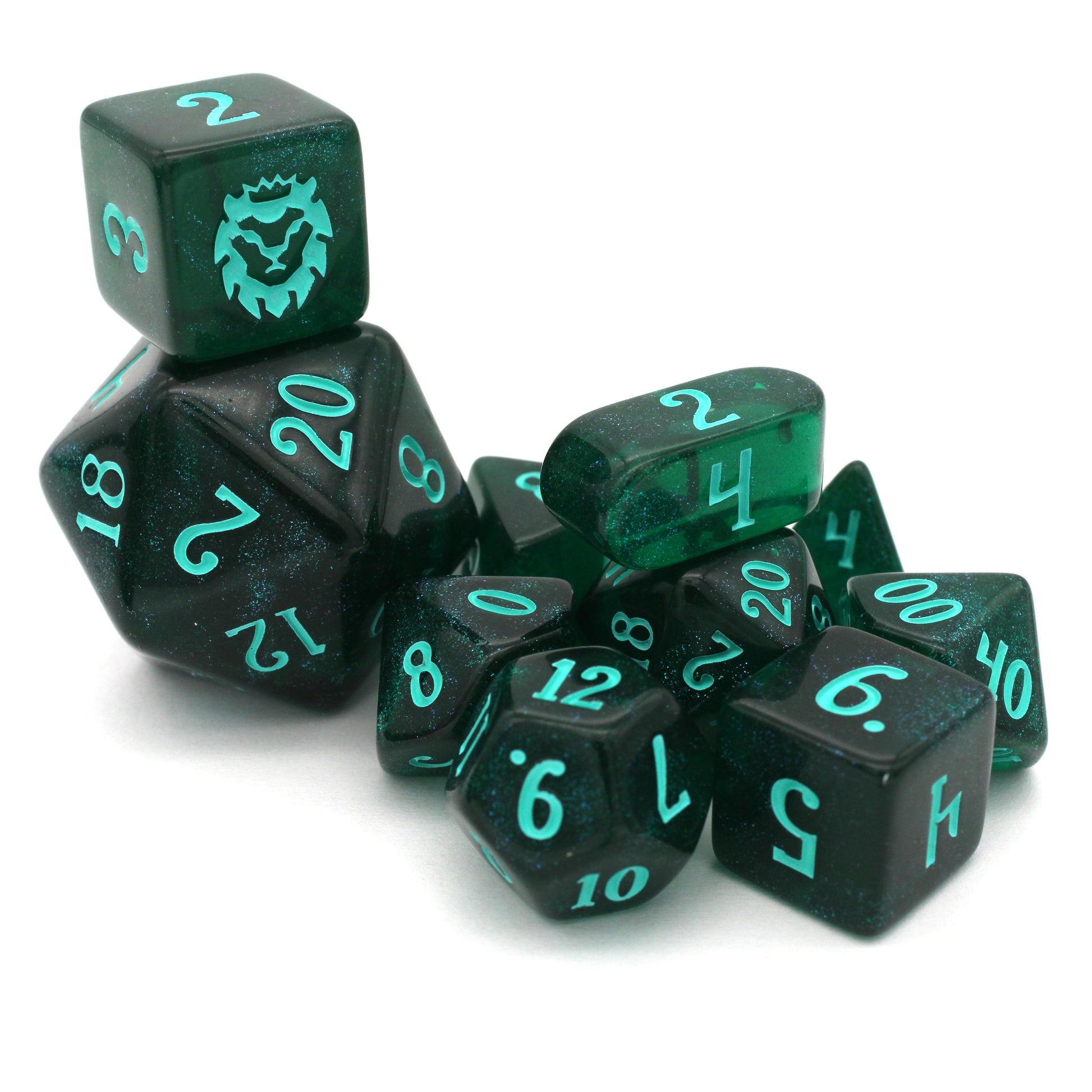 Leviathan is a 10-piece set of dark teal acrylic dice, filled with glistening blue glitter and inked in seafoam green.
