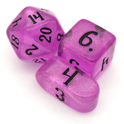 Lich Queen Barbie is a 10-piece set of translucent, glittery, bright pink dice inked in nightmare black.