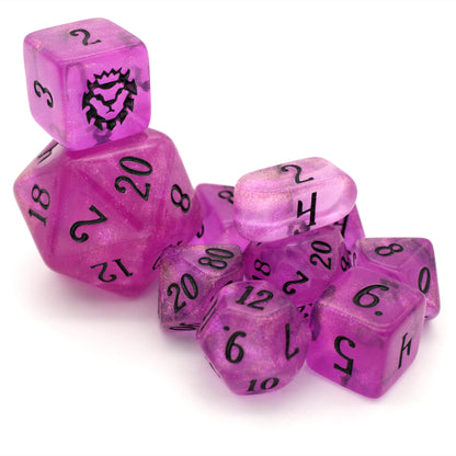 Lich Queen Barbie is a 10-piece set of translucent, glittery, bright pink dice inked in nightmare black.