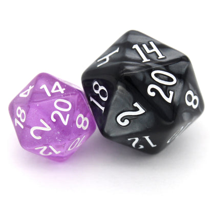 Lilactivity is a 7-piece, 13mm polymer set of transparent purple resin dice, shimmering with silvery glitter and inked in bright white. It belongs to our tiny but mighty Wee Lads collection. Standard d20 pictured for scale.