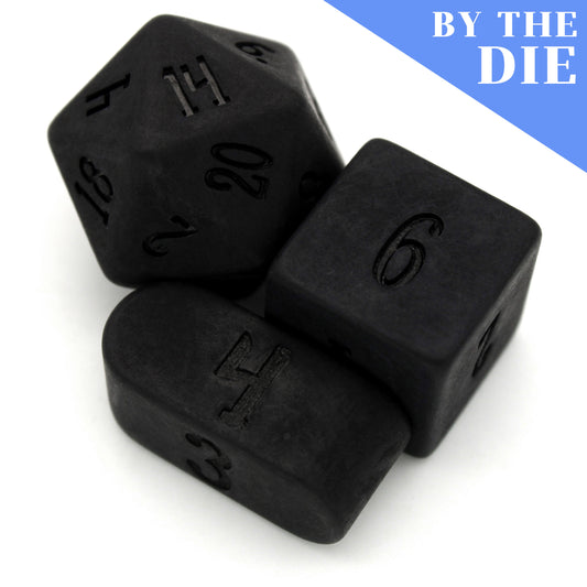 Lump of Coal (by the die) individual dice are matte black resin dice.