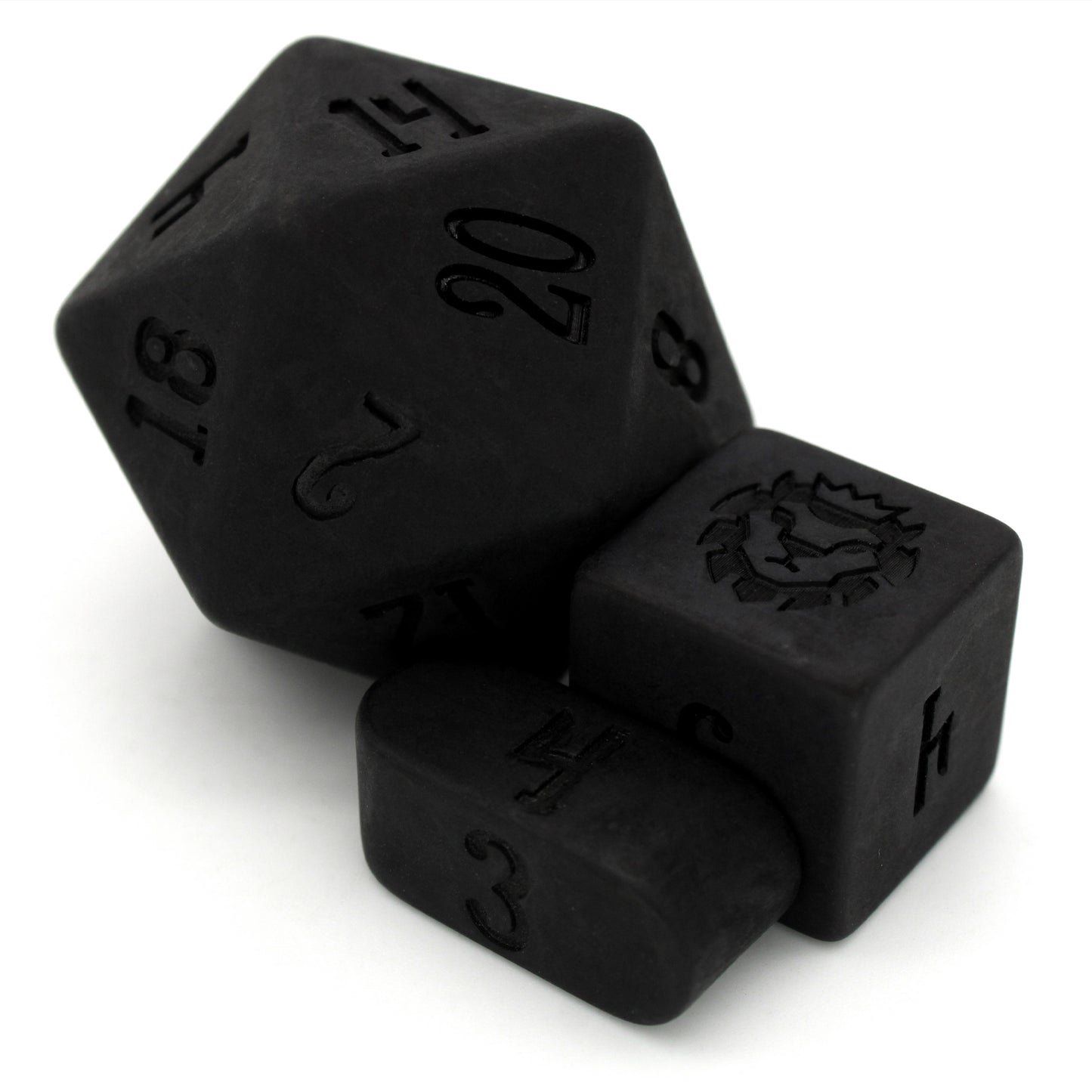 Lump of Coal is a 10-piece set of matte black resin dice.