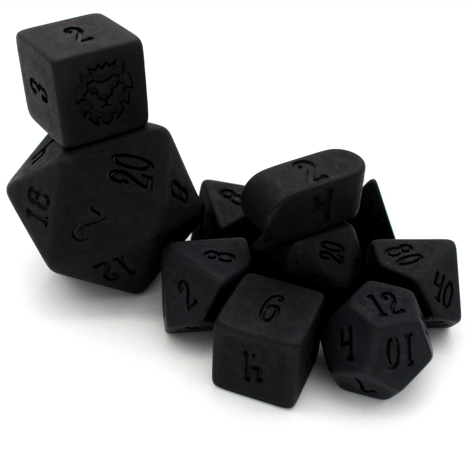 Lump of Coal is a 10-piece set of matte black resin dice.
