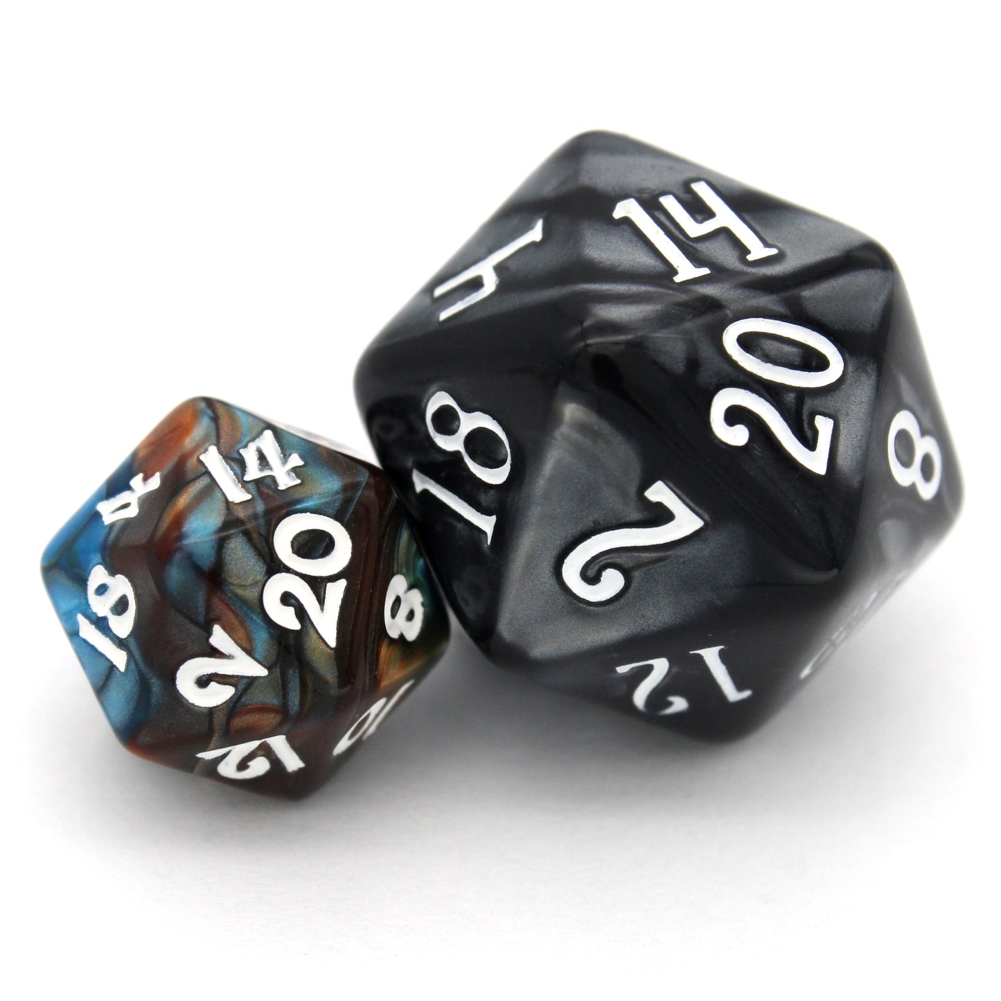 Magewrights is a 7-piece, 13mm polymer set of swirled blue and orange acrylic dice, inked in white. It belongs to our tiny but mighty Wee Lads collection. Standard d20 pictured for scale.