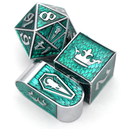Maleficent is an 8-piece Dice Envy Original set of silver metal dice in our Raven Queen mold, cloaked in evil green enamel.