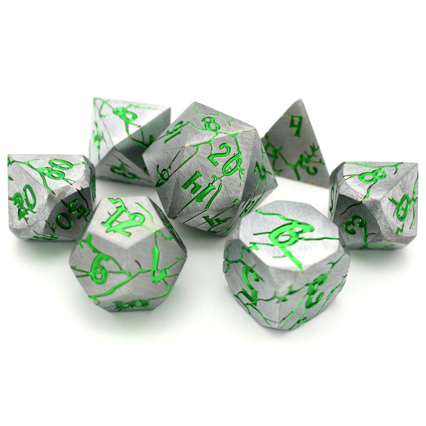 Minauros Mire is a 7-piece set of silver dice, streaked through with cracks and numbers of metallic green.