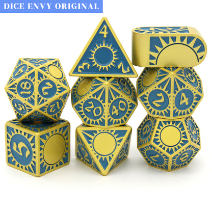 Morninglord is a Dice Envy Original 8-piece metal set of gold-toned zinc dice, filled with teal enamel.