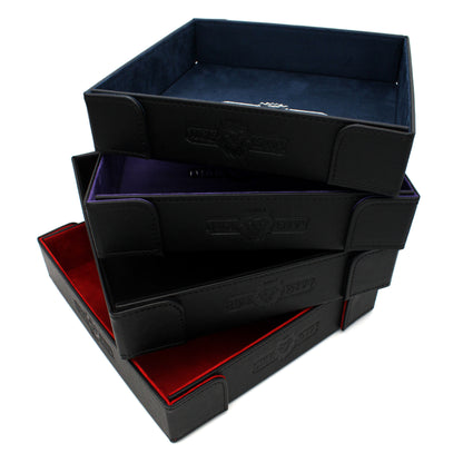 Made of vegan leather and microsuede, our dice trays have hidden magnets that hold them together and are available in druid green, warlock purple, barbarian tan, cleric blue, rogue red, and necromancer black.