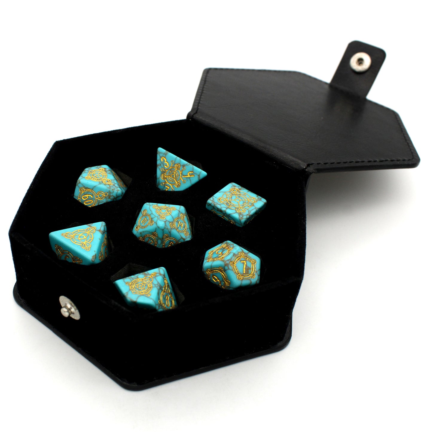 Oasis is a 7-piece set of dice cut from lab-made turquoise, engraved with Dice Envy's exclusive Sigil design and inked in gold.