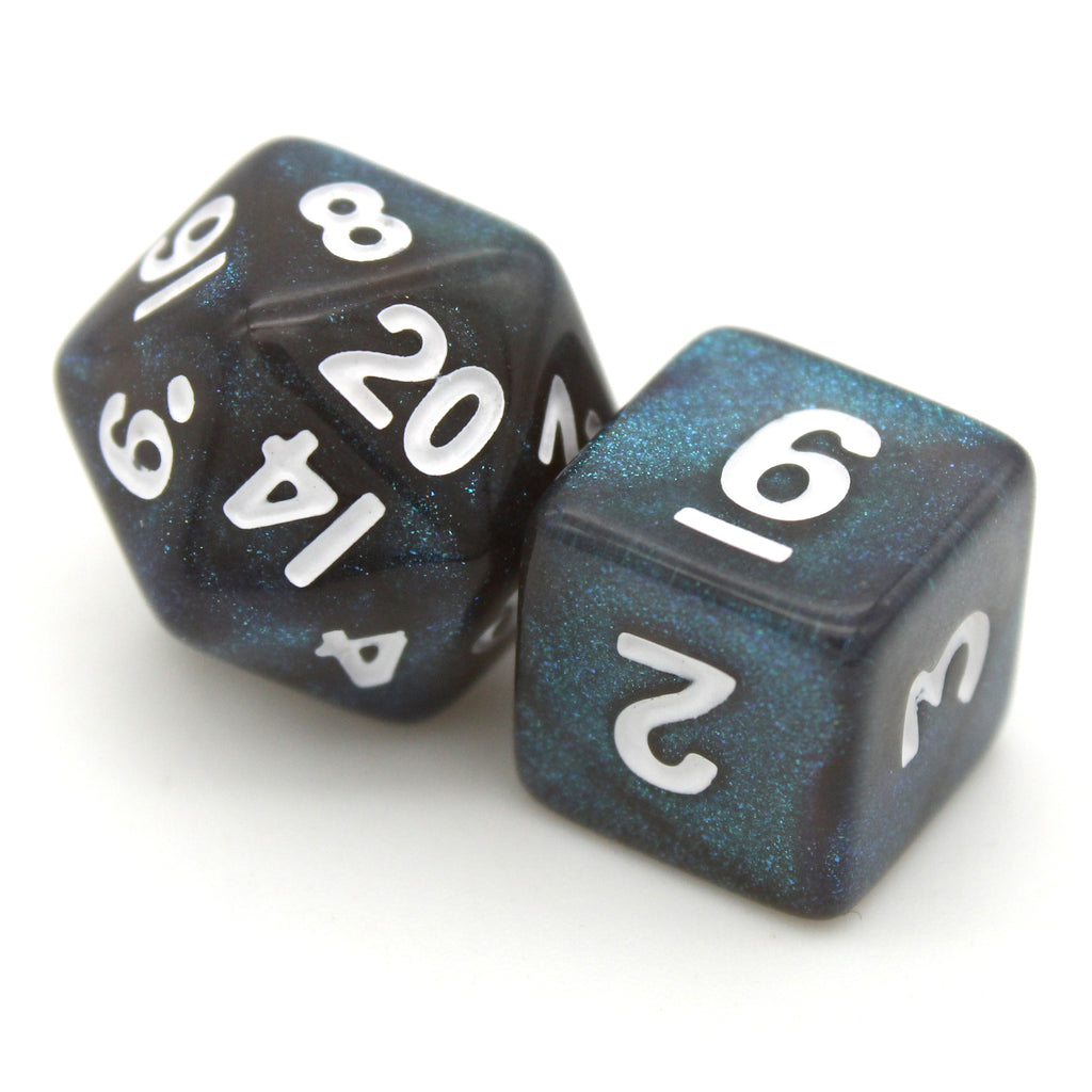 Occult Oceans is a 7-piece, 13mm, dark grey resin dice set featuring teal blue micro glitter, inked in white.