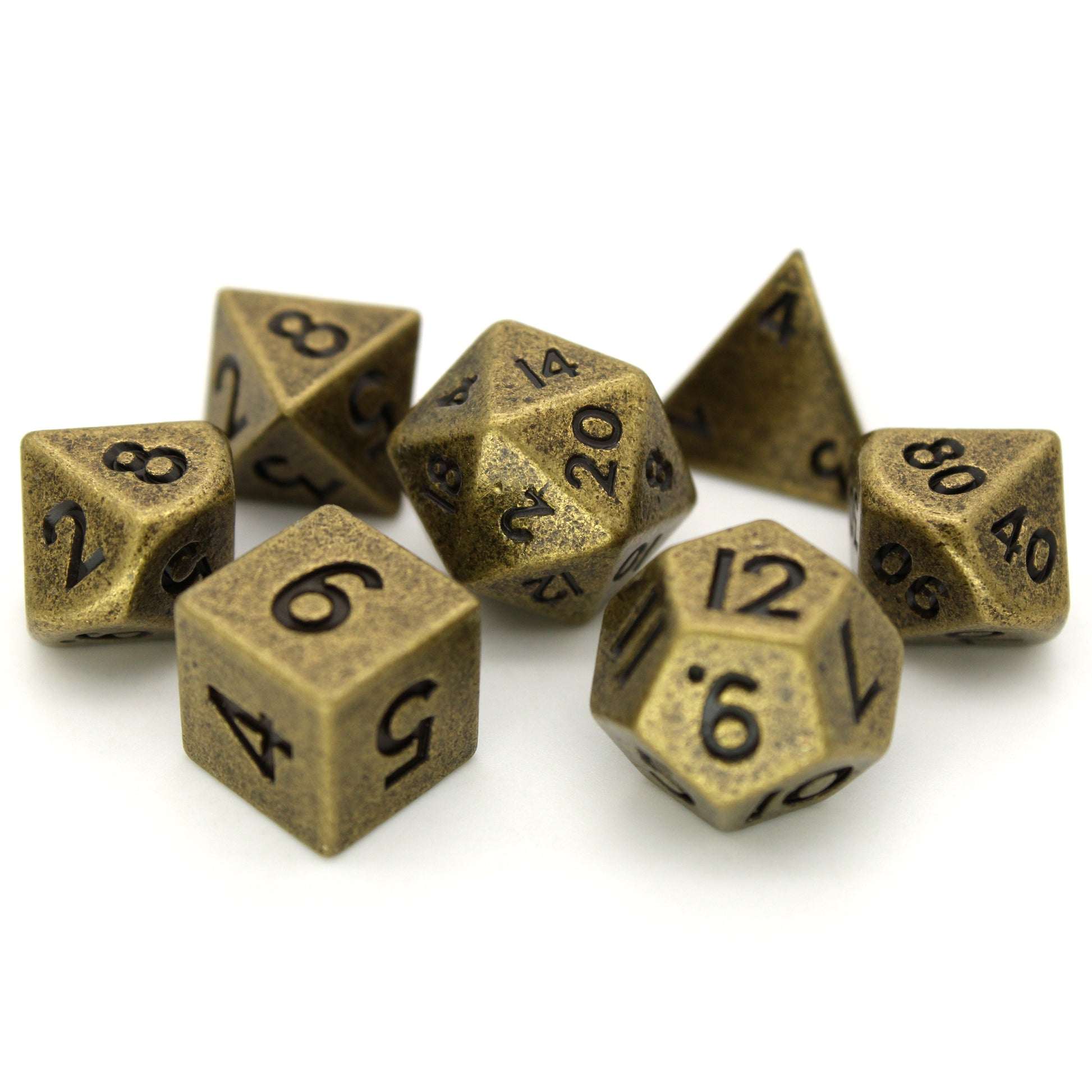 Peanuts is a 7-piece set of ancient gold colored 10mm metal dice.