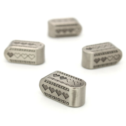 Pixel Hearts: Death Mountain are custom Infinity d4s cast in silver metal.