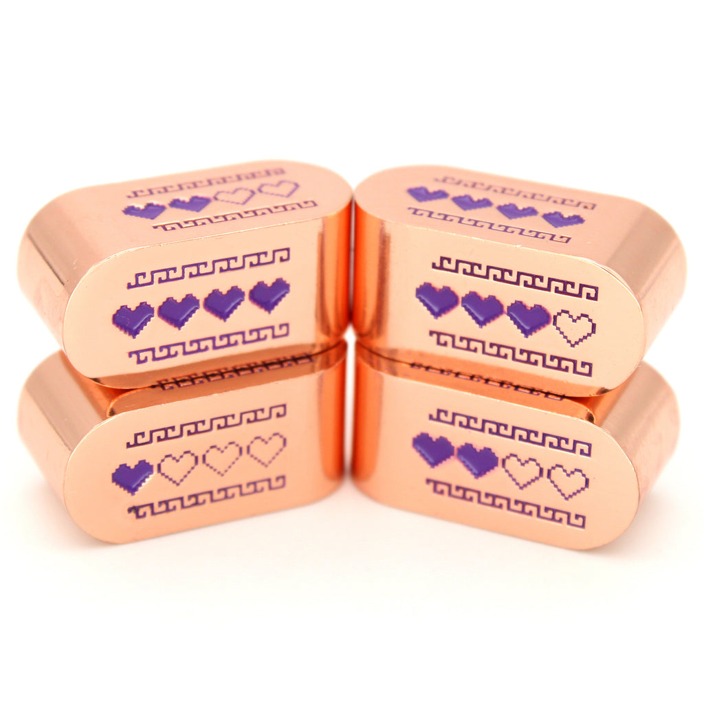 Pixel Hearts: Heartsong are custom rose gold metal Infinity d4s with lavender enamel.
