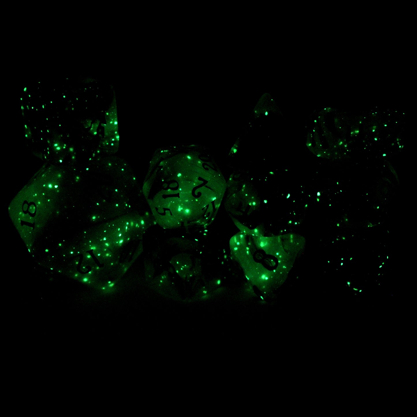 Poison Cloud is a 10-piece, black and grey, glow in the dark resin set with subtle silver micro glitter, inked in white.