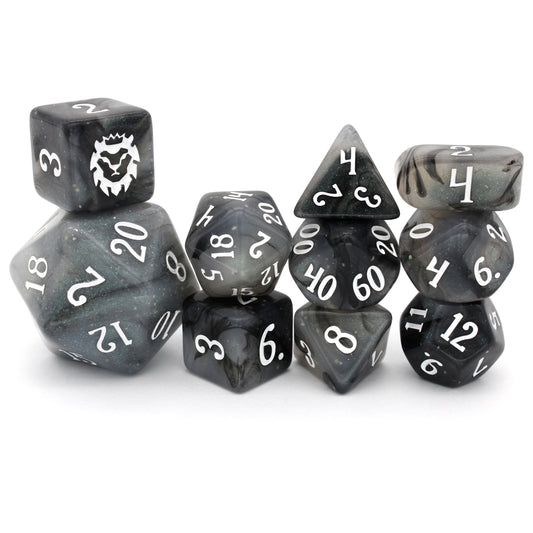 Poison Cloud is a 10-piece, black and grey, glow in the dark resin set with subtle silver micro glitter, inked in white.