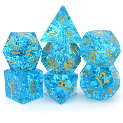 Pool Party is a 7-piece set of teal blue glass dice with a crackle effect and gold inked numbers.