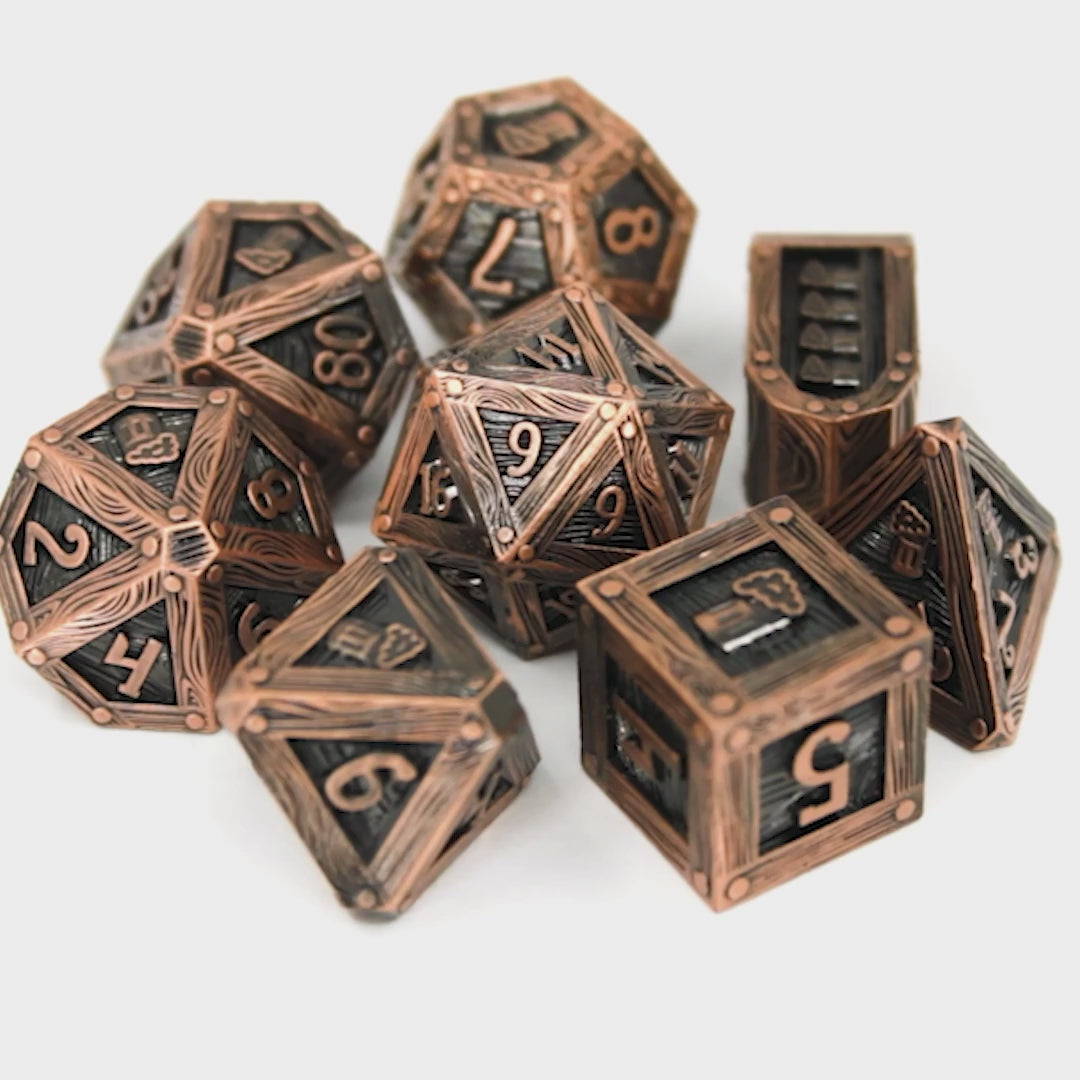 You Meet In A Tavern is a Dice Envy Original 8-piece set of aged copper metal dice in our new Crate mold.