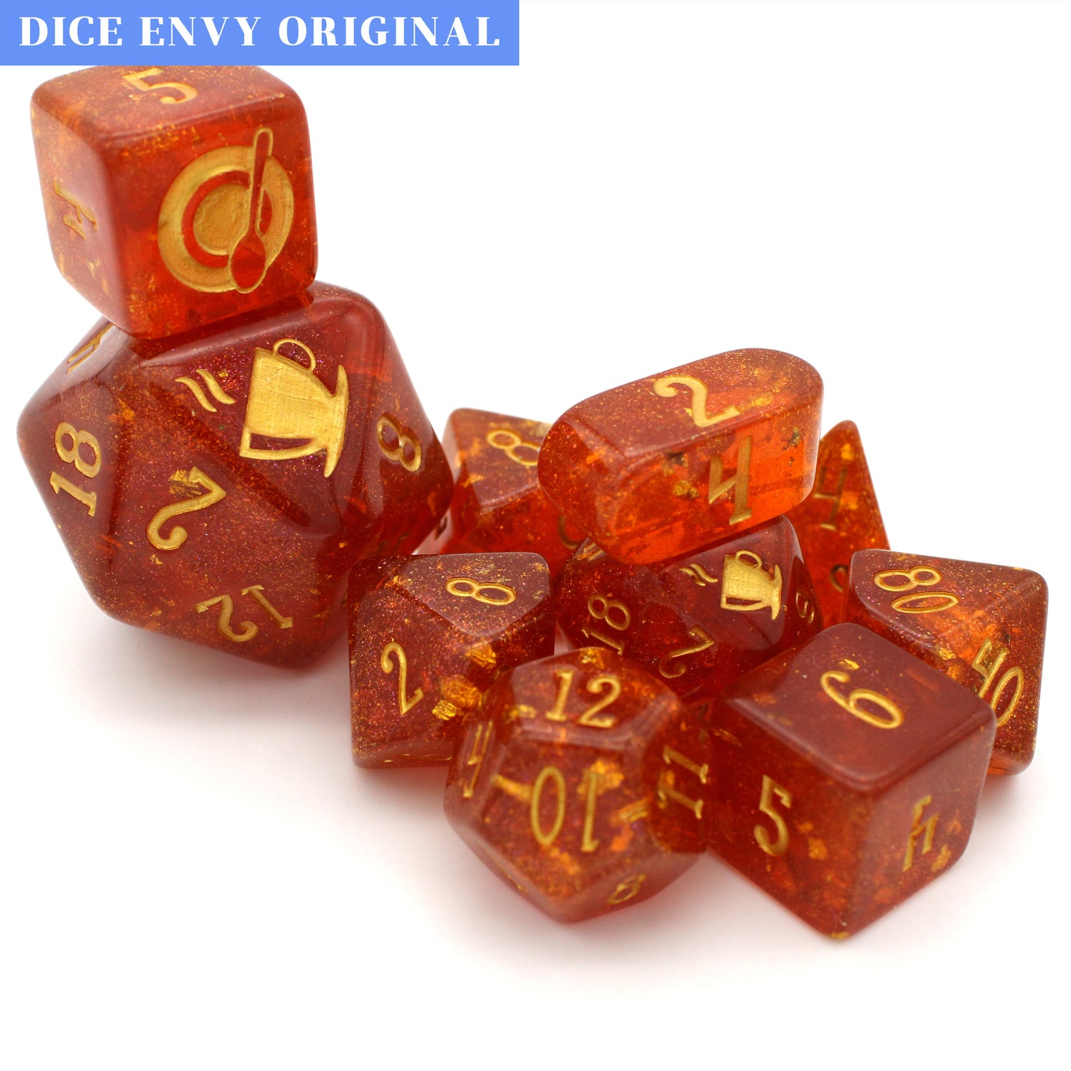 Pumpkin Dice Latte is a 10-piece resin set in our coffee mold, featuring sprinkles of gold glitter, a luscious swirl of gold microglitter, and just a *hint* of nutmeg.
