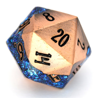 Rolling River is an 8-piece metal dice set with a rich copper frame and brilliantly glittering teal-blue enamel.