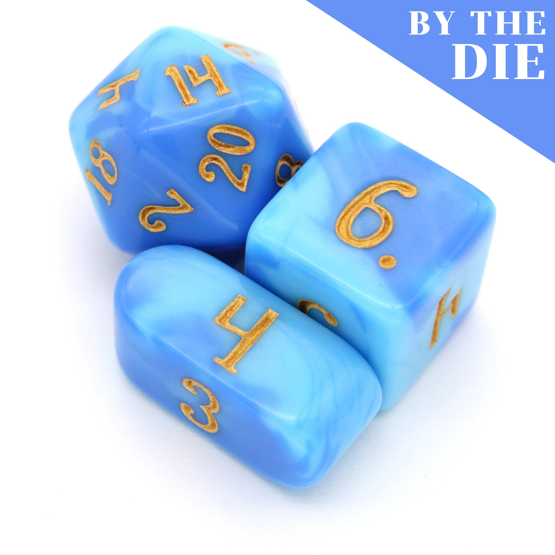 Shape Water (by the die) individual dice come in swirled shades of blue acrylic, inked in beach sand yellow.