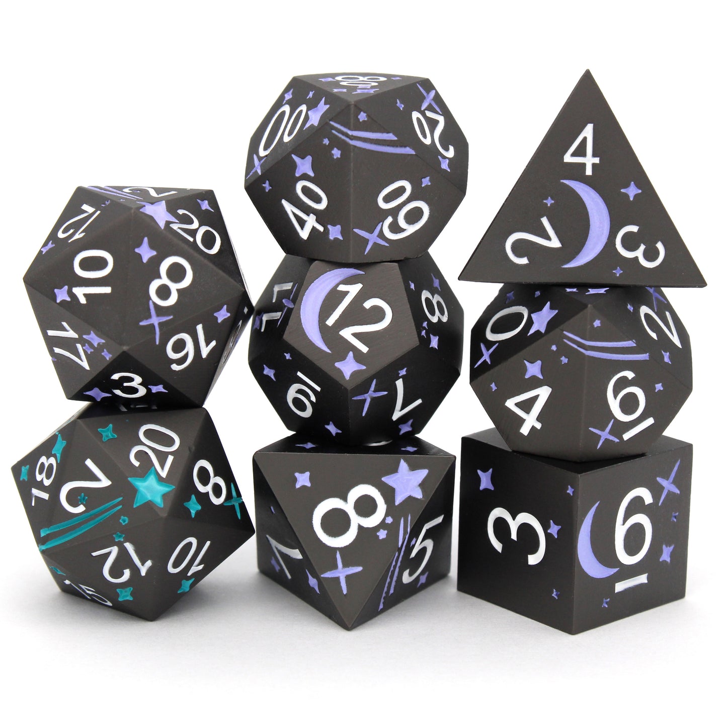 Shooting Stars is an 8-piece standard set of metal dice featuring stars, comets, and a contrasting d20 to give your wish advantage on coming true!