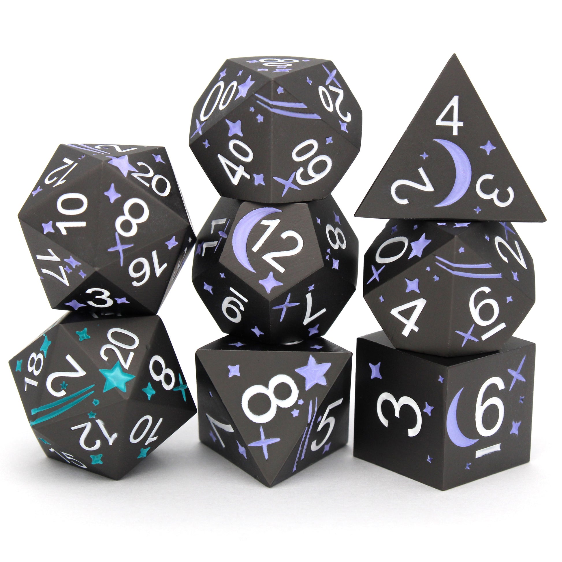 Shooting Stars is an 8-piece standard set of metal dice featuring stars, comets, and a contrasting d20 to give your wish advantage on coming true!
