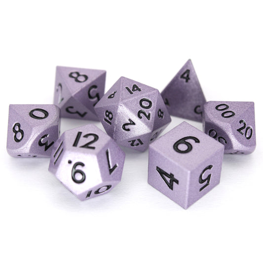 Sneaks is a 7-piece set of shimmering, purple colored 10mm metal dice.