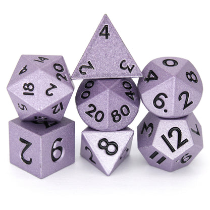Sneaks is a 7-piece set of shimmering, purple colored 10mm metal dice.