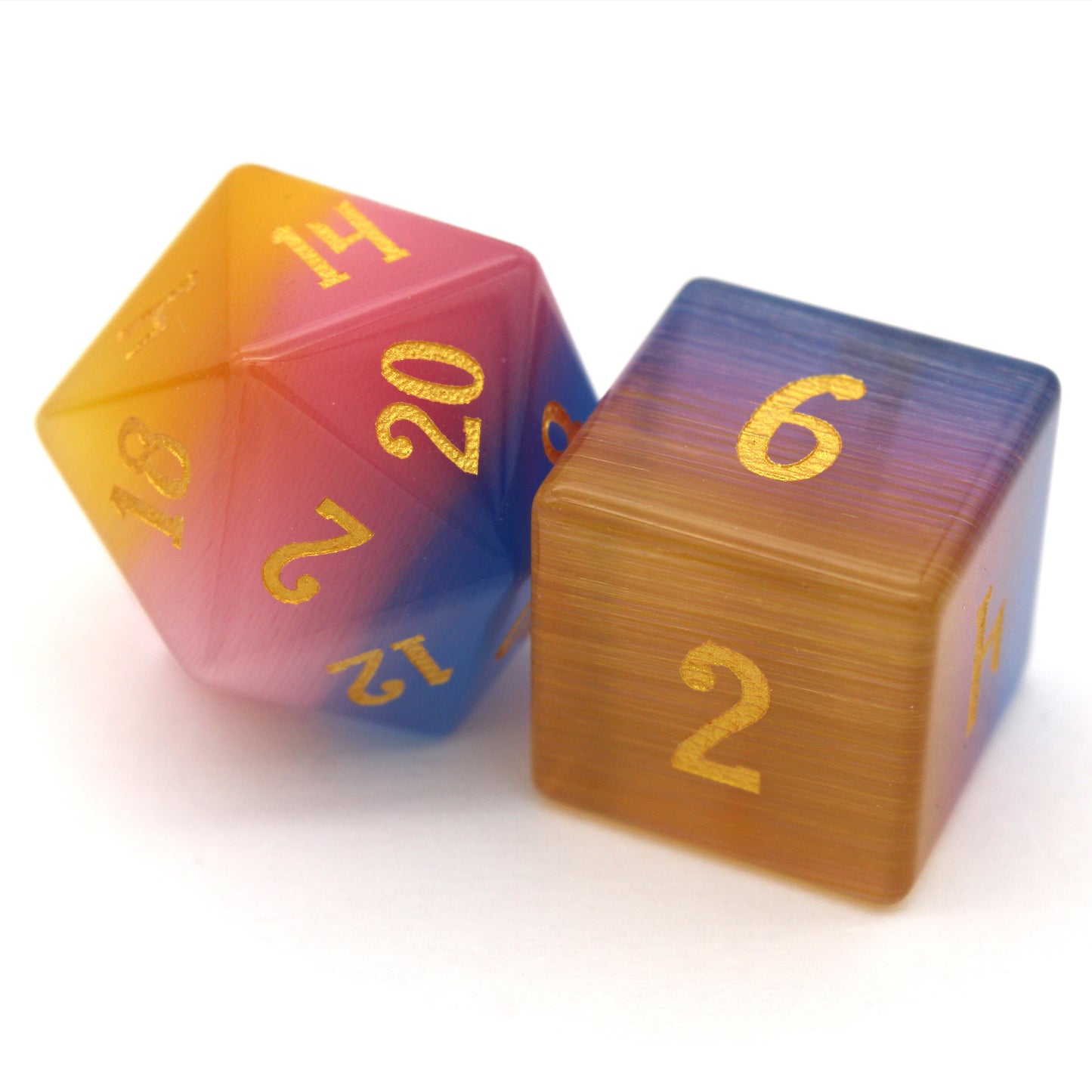 Sparkle Horse is a 7-piece set of blue, yellow, and pink glass dice with gold inked numbering.