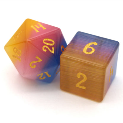 Sparkle Horse is a 7-piece set of blue, yellow, and pink glass dice with gold inked numbering.