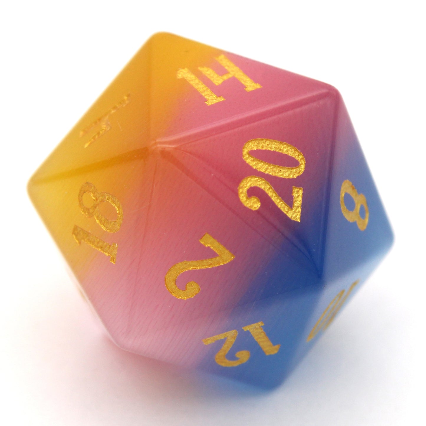 Sparkle Horse is a 7-piece set of blue, yellow, and pink glass dice with gold inked numbering.