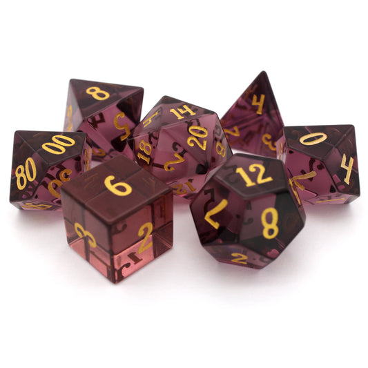 Sugarplum is a 7-piece set of sweet, purple crystal dice with gold inked numbers.